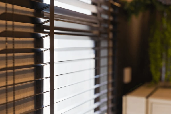 A close-up view of stylish Venetian blinds, offering a modern and sleek window treatment choice for 2025 Dubai interiors. Top best blinds window blinds 2025.