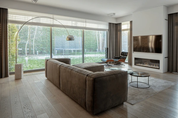 A stylish living room featuring Dubai Blinds 2025 soundproof, offering the best quality light control, privacy, and modern elegance.