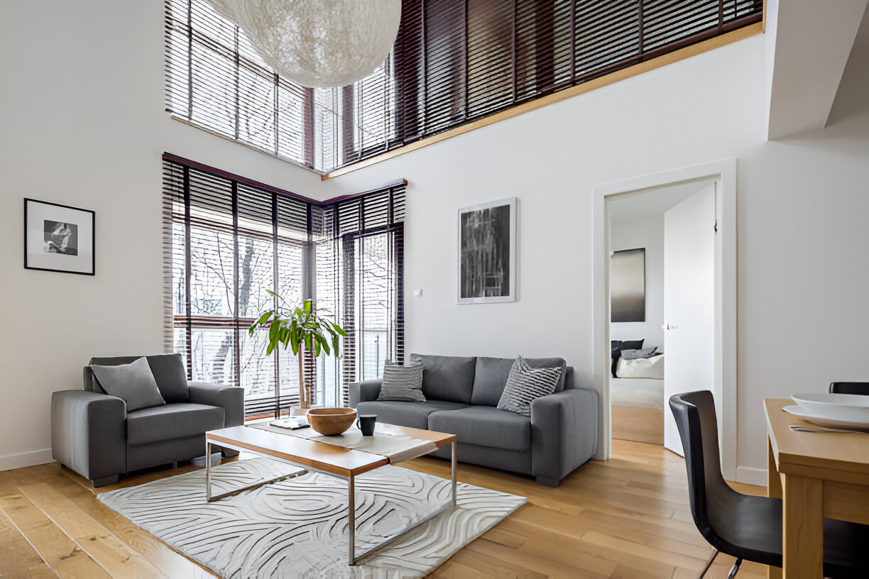 A modern living room with dark wooden window blinds, combining Emirati traditional aesthetics with a trendy, cultural touch, perfect for Dubai homes in 2025.