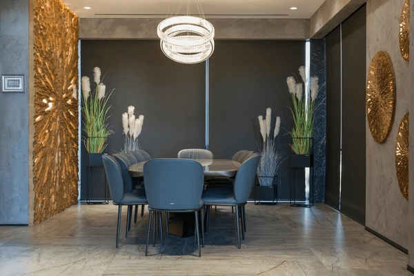 A modern dining room featuring Dubai Blinds 2025 best blackout roller blinds, ensuring privacy, elegance, and soundproofing.
