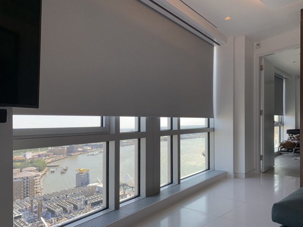 High-rise apartment featuring motorized blackout blinds 2025, offering top-rated, custom, and affordable light control solutions in Dubai.