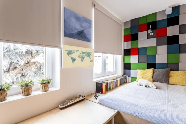 A modern bedroom with stylish blinds, minimalistic design, and comfortable ambiance, featuring a sleek and elegant setup ideal for Dubai homes.