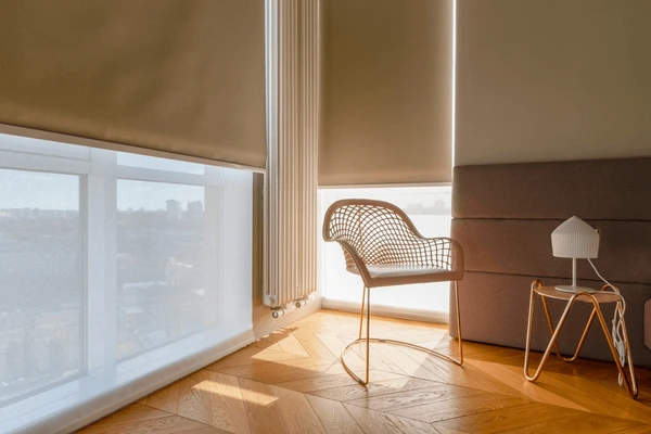 Elegant blackout roller blinds in a modern Dubai home, providing complete privacy and light control.