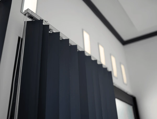 Close-up of sleek recycled vertical blinds in a modern Dubai home, offering a stylish, elegant, and eco-friendly window solution.