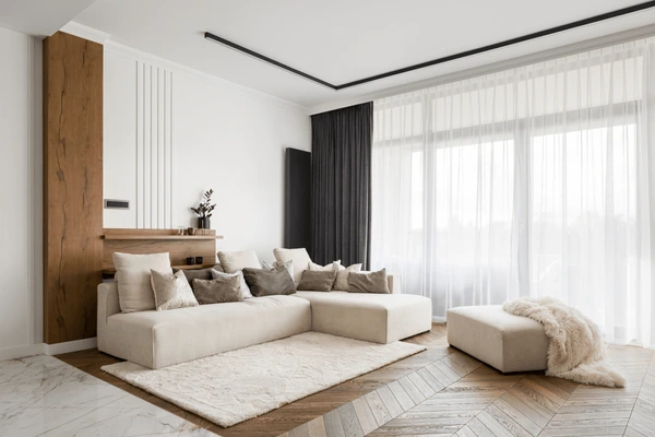 Modern living room with heat-resistant curtains, creating a sleek and cozy atmosphere
