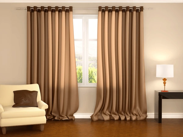 Sleek wave curtains framing a large window in a stylish, modern living room, ideal for enhancing Dubai homes in 2025.